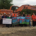 group picture with sponsors and volunteers at goldthorpe embankment