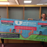 liane and claire with banner to promote goldthorpe embankment