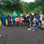 schoolchildren making birdfeeders at Goldthorpe Embankment