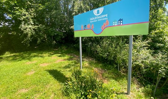 the goldthorpe railway embankment entrance welcome sign